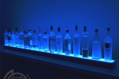 single_tier_led_bar_shelf_blue_lighting