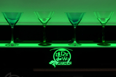 two_step_led_display_shelf_green_glassware