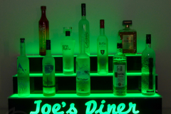three_step_led_liquor_shelf_green_restaurant