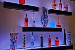 led_display_shelf_abstract_glass_art_blue_glow