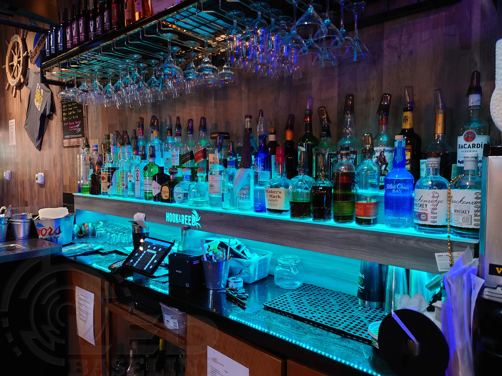 commercial LED bar shelving installation at Hook and Reel in Broomfield Colorado featuring illuminated back bar display